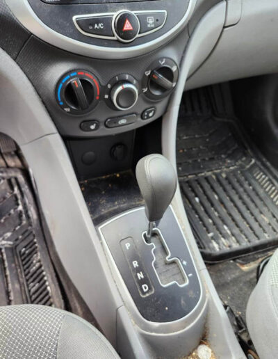 Before - dirty mats, gearshift area